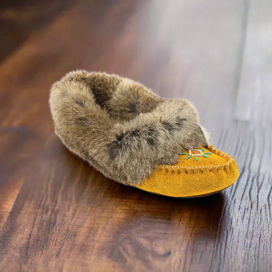 womans moccasins in tan with beading and fleece lining moccasins are made in canada