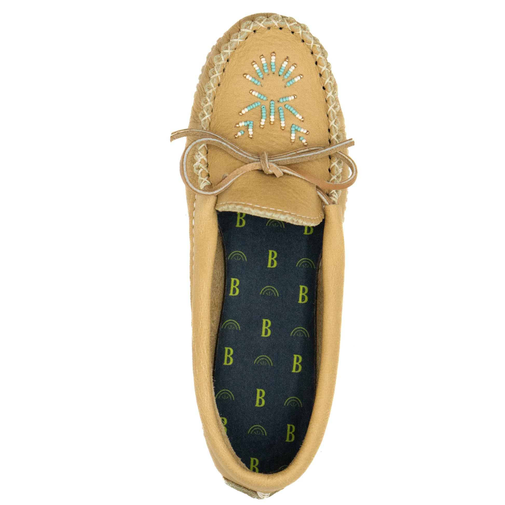 Beige moccasin shoe with braided details on a white background