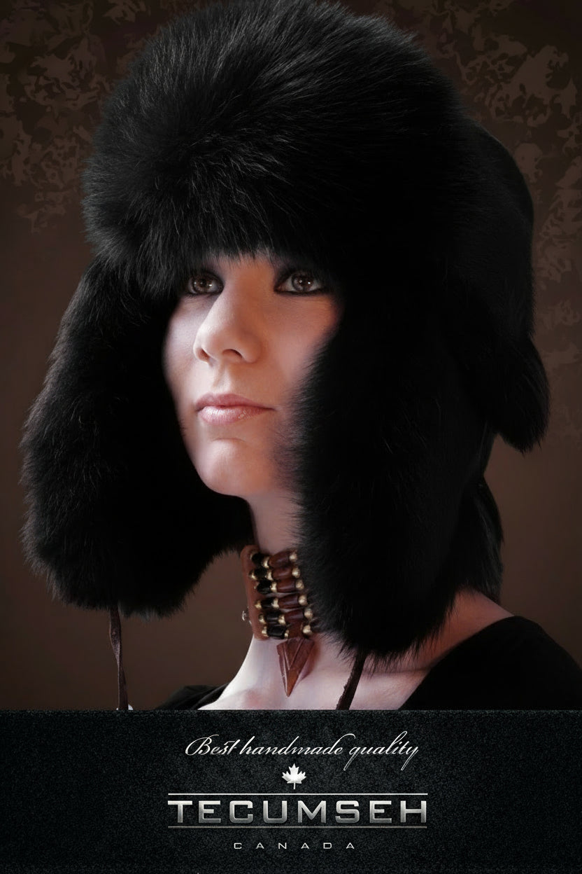 Person wearing a black fur hat with 'Tecumseh Canada' branding on a dark background