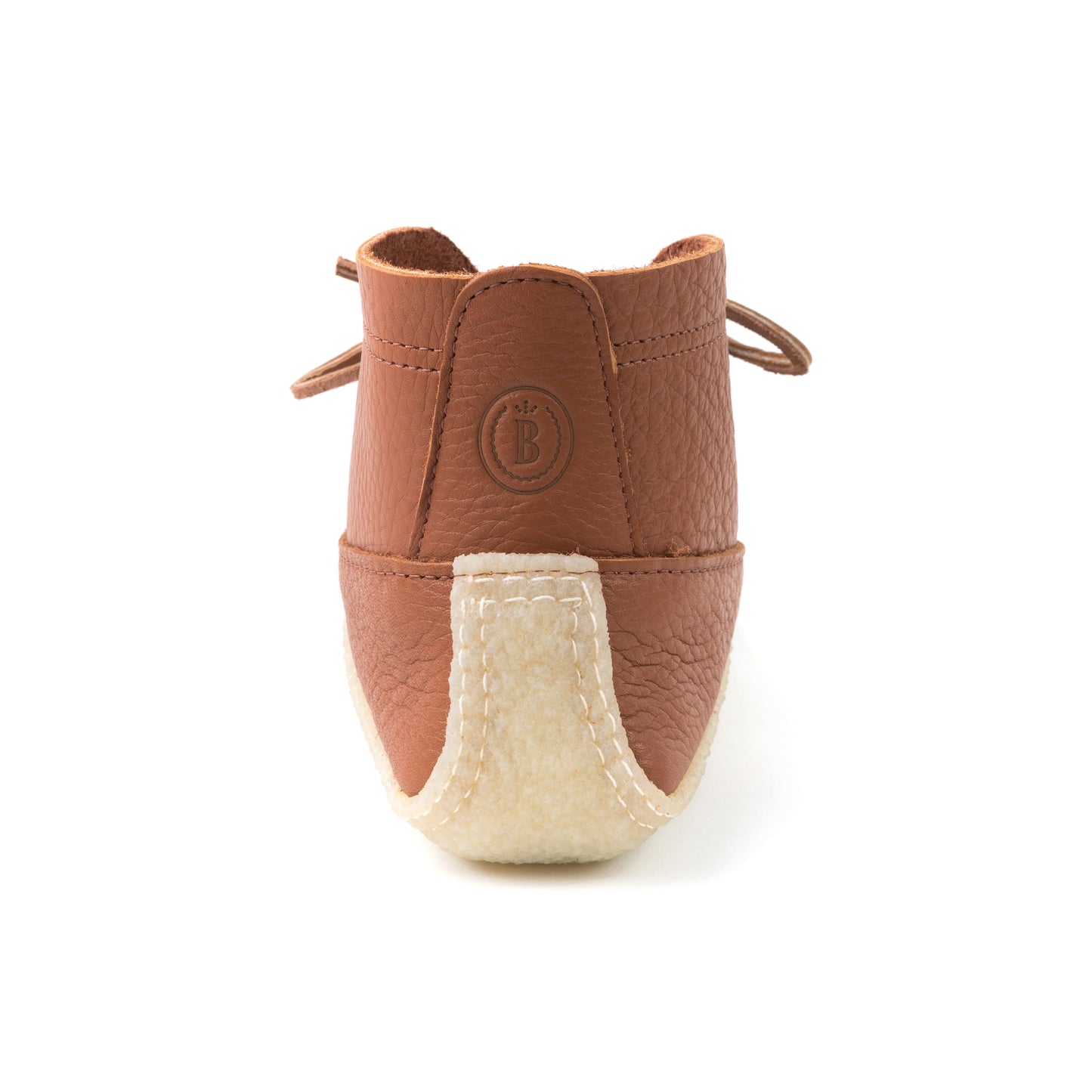 Brown baby bootie with beige sole on a white background