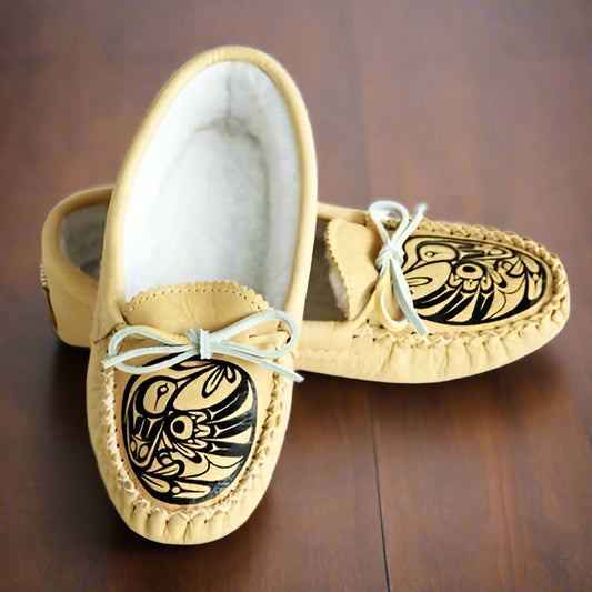Womens Spirit Moccasins In Natural Moosehide Moccasins With Fleece Lining Featuring The Life Crest Hummingbird Artwork of Bill Helin