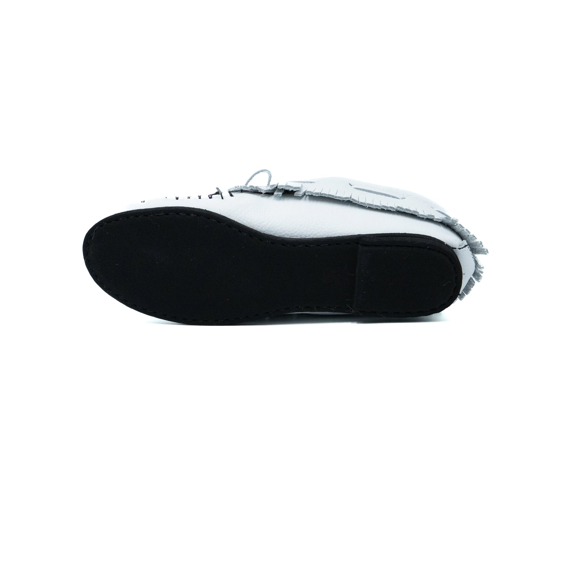 White shoe with fringes on a white background