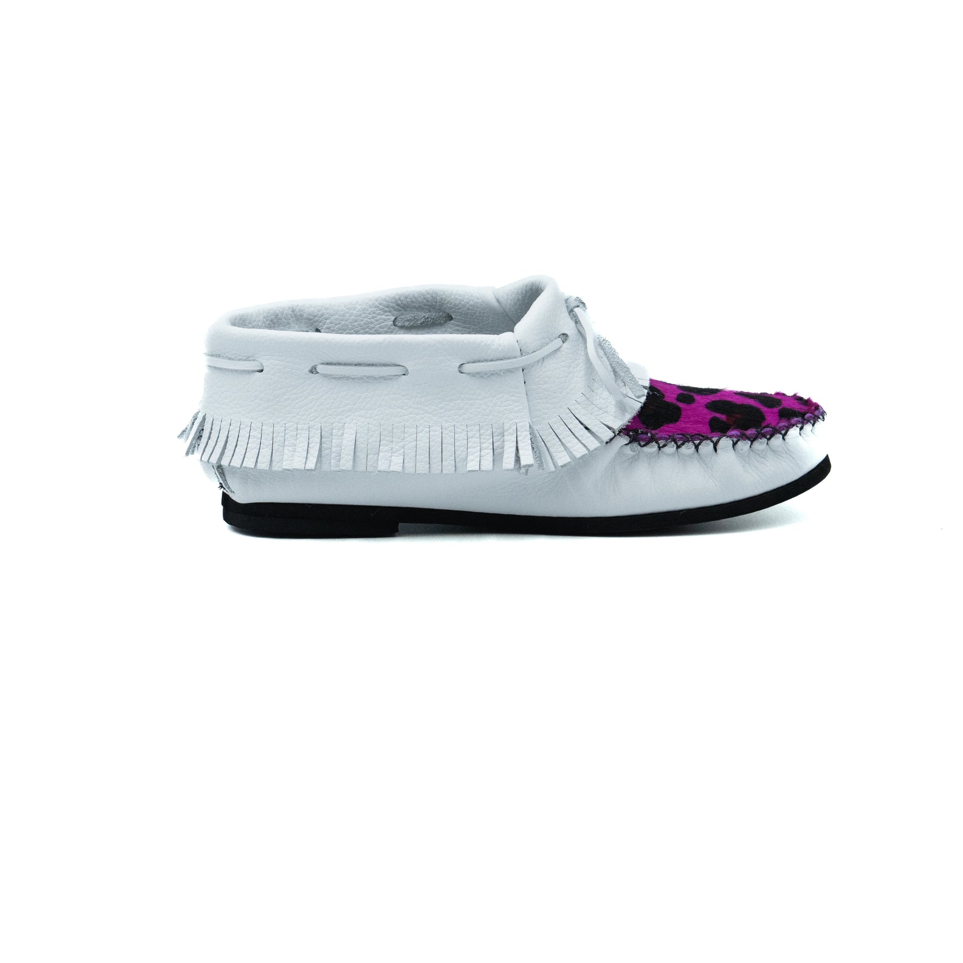 White moccasin shoe with purple paw print on a white background
