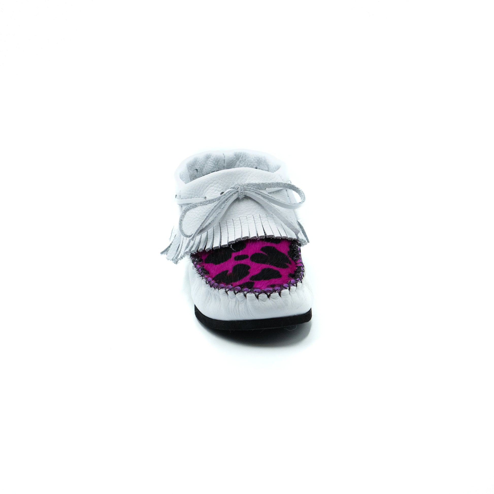 White boot with purple leopard print sole on a white background