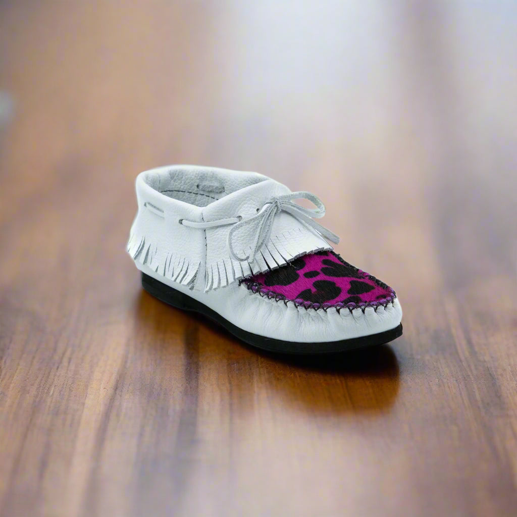 White moccasin shoe with purple and black leopard print insole on a white background