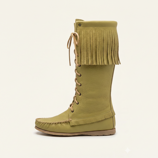 Green fringed boot on a white background