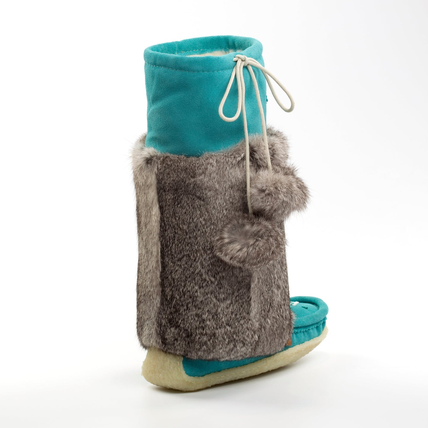 Teal and gray slipper with fur trim on a white background