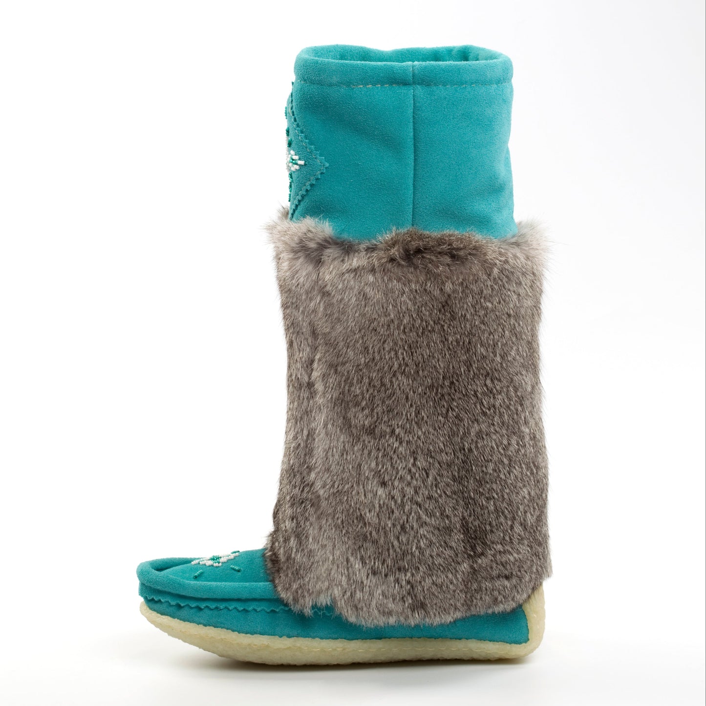 Turquoise Mukluks with gray fur trim on a white background
