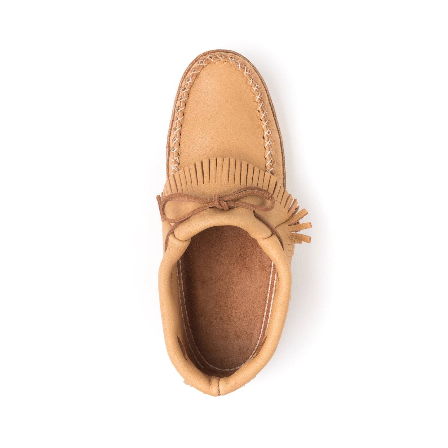 Tan moccasin shoe with fringes on a white background