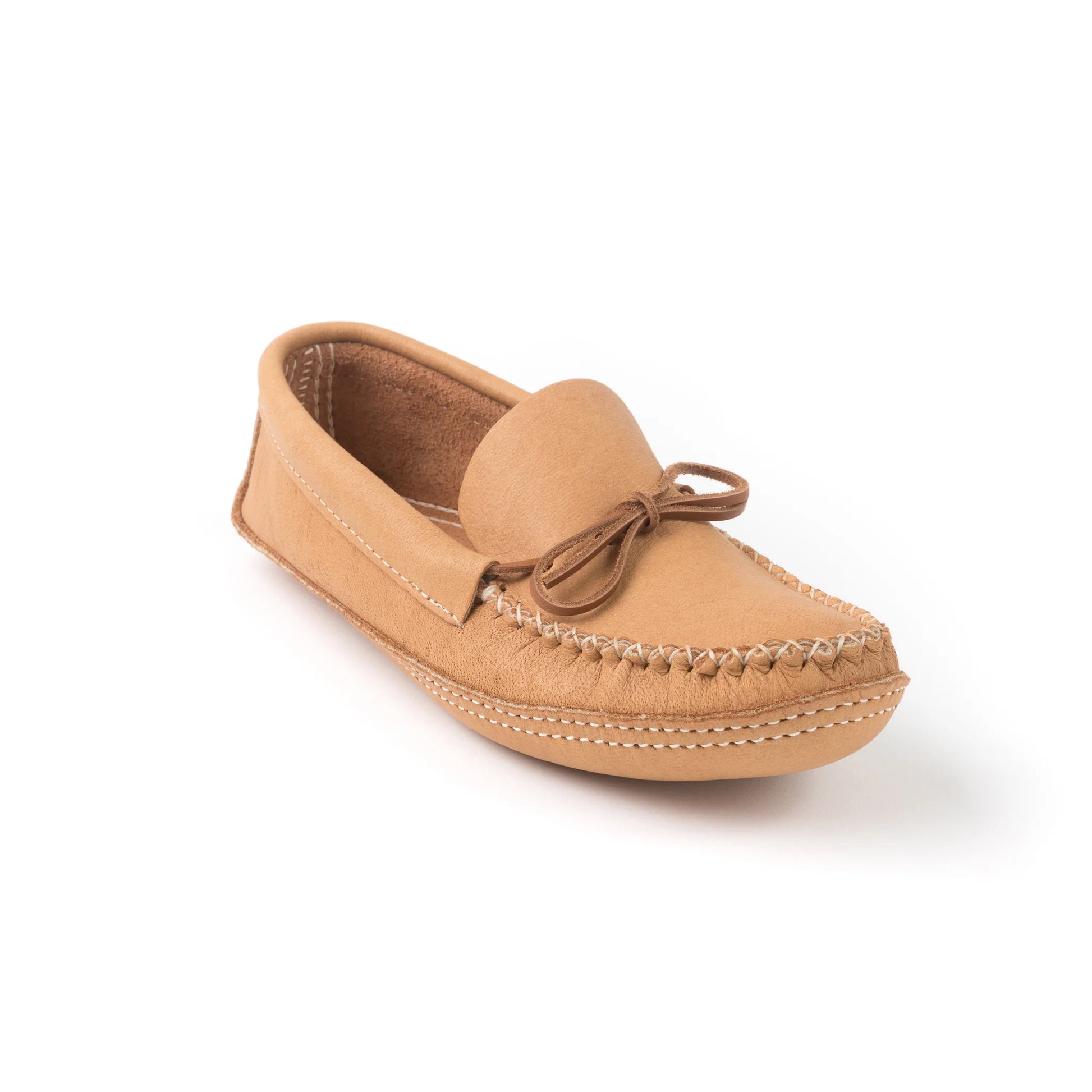 Tan moccasin shoe on a white background