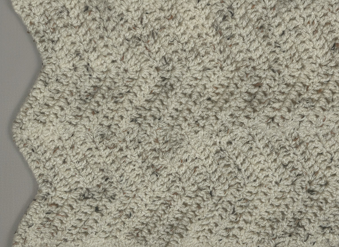 Close-up of textured gray carpet