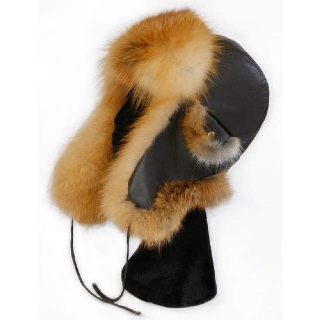 Black leather headband with brown fur accents on a white background
