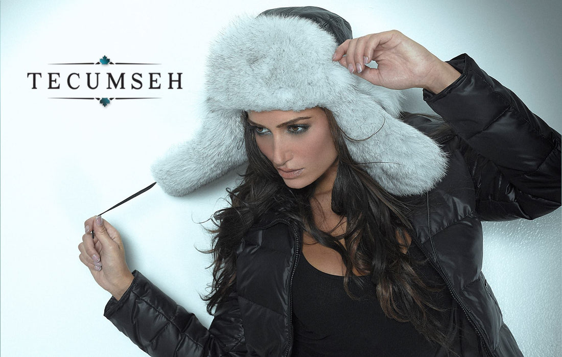 Woman wearing a blue fox fur bomber hat from Tecumseh Canada with leather shell 