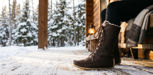 woman wearing Tecumseh Mukluks snowshoe boots 