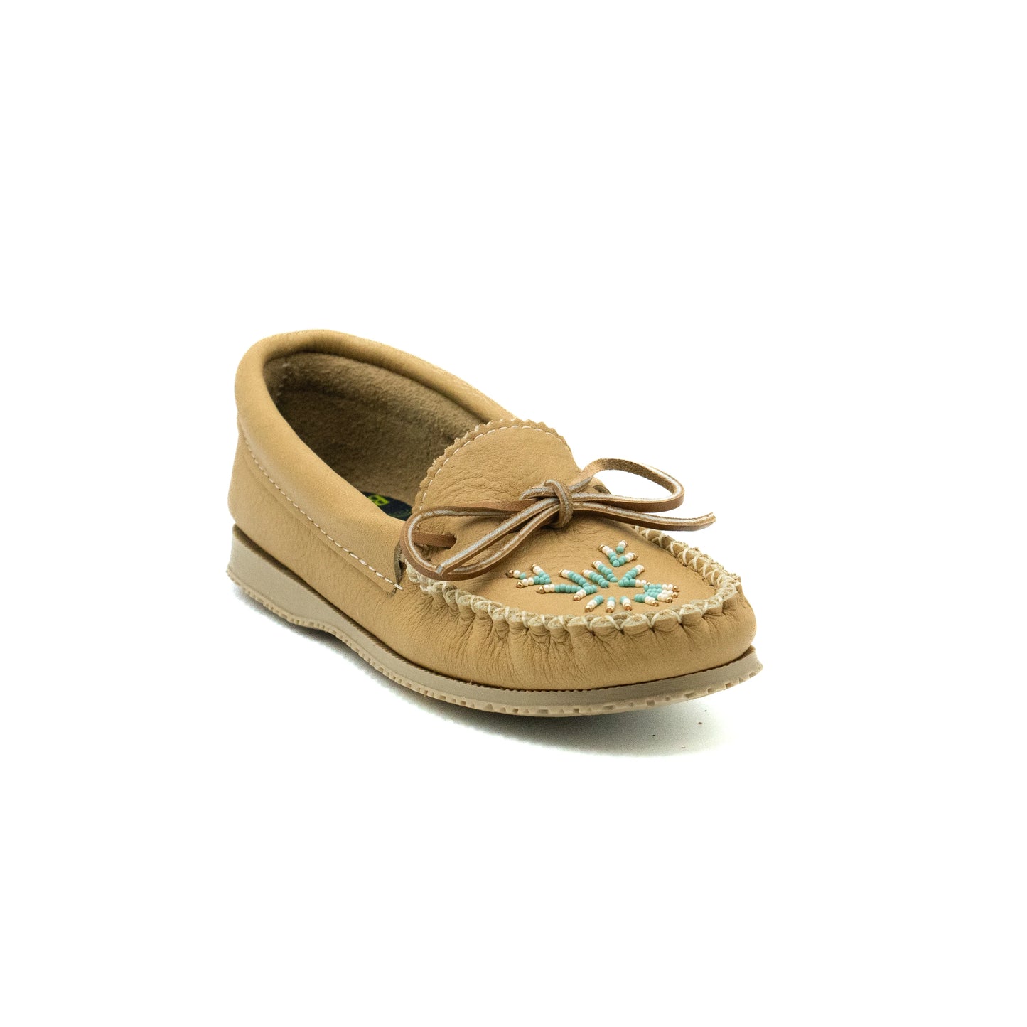 Tan moccasin shoe with decorative elements on a white background