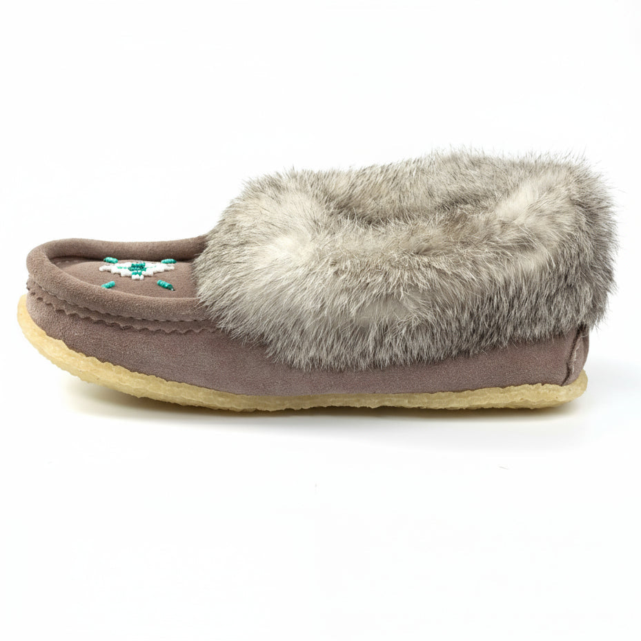 Slipper with gray fur lining on a white background