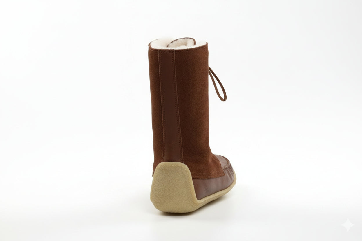 Brown lace-up boot on a white background