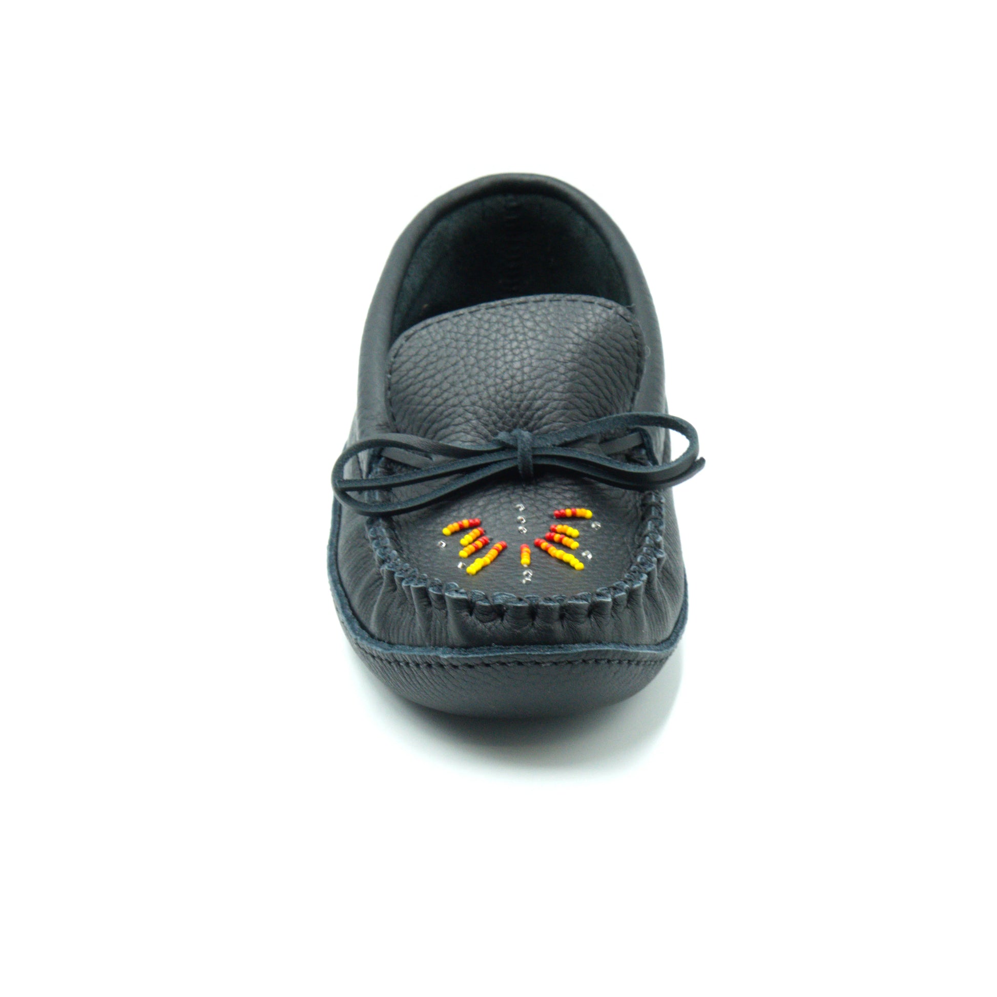Black moccasin shoe with colorful bead design on a white background