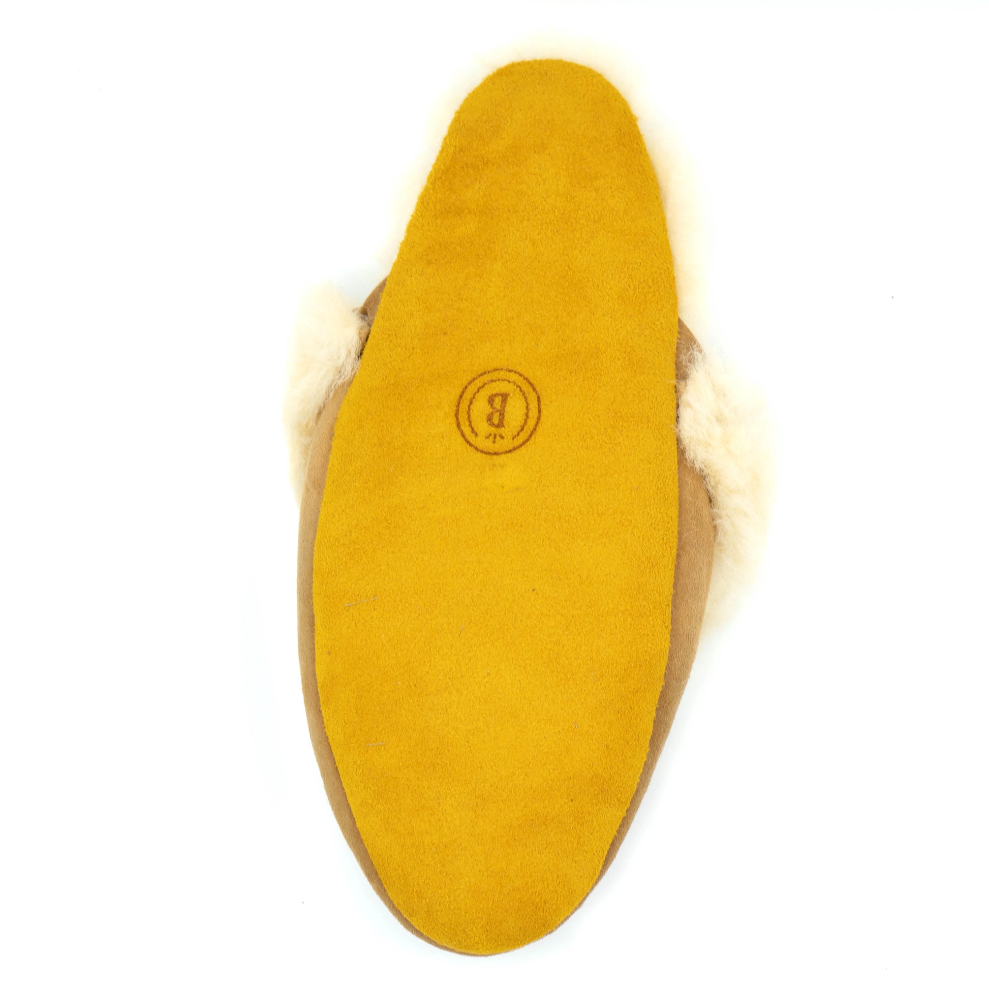 Yellow shoe insole with white fur lining on a white background