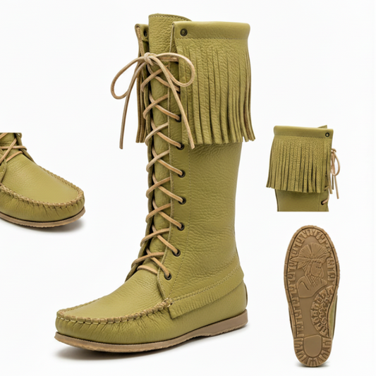 Green knee-high boots with fringes and laces on a white background