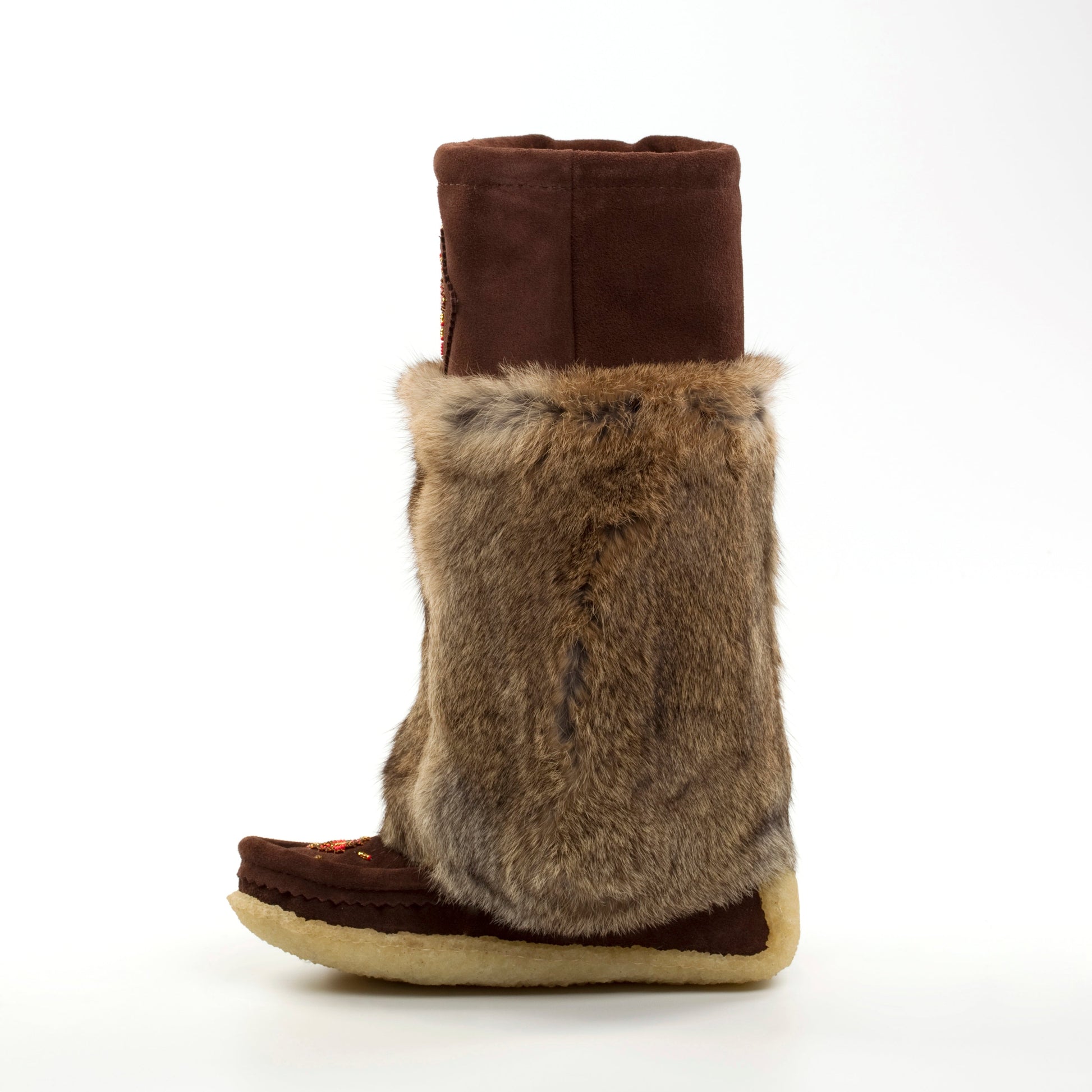 Brown boot with brown fur trim on a white background
