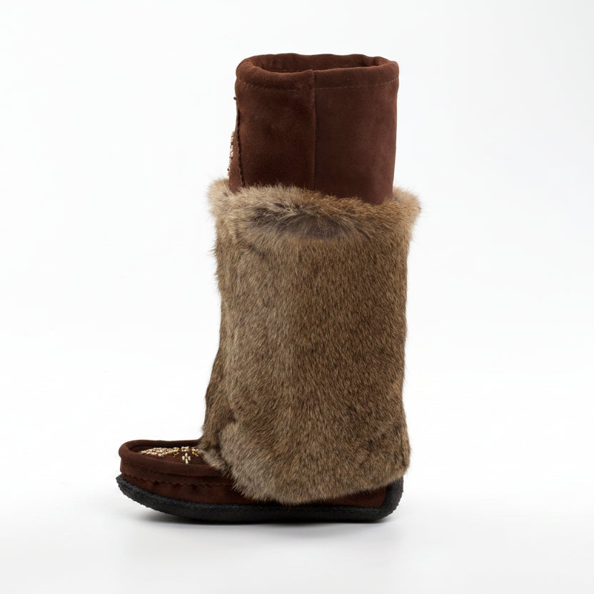 Brown furry boot on a white background