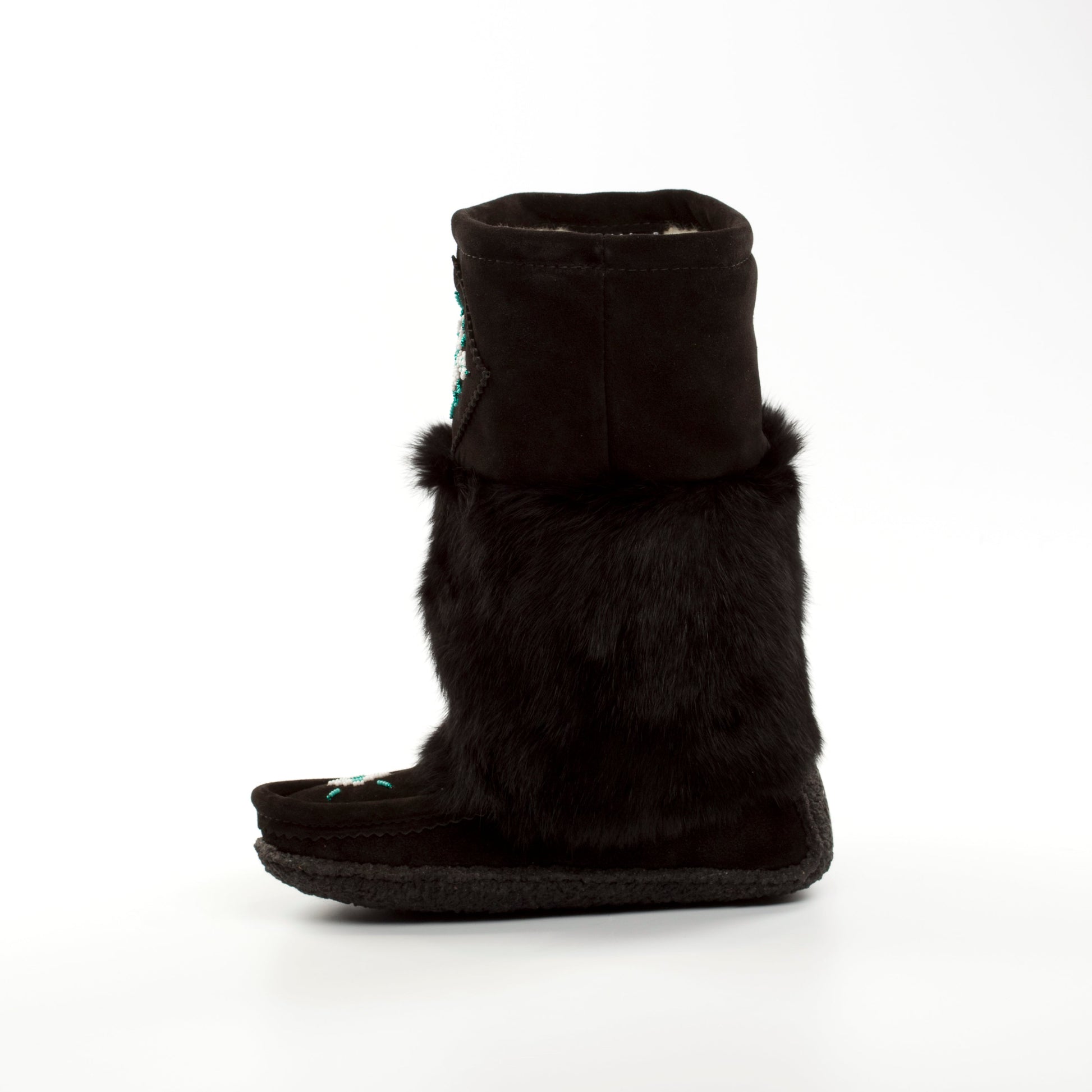 Black mukluk boot with fur trim on a white background