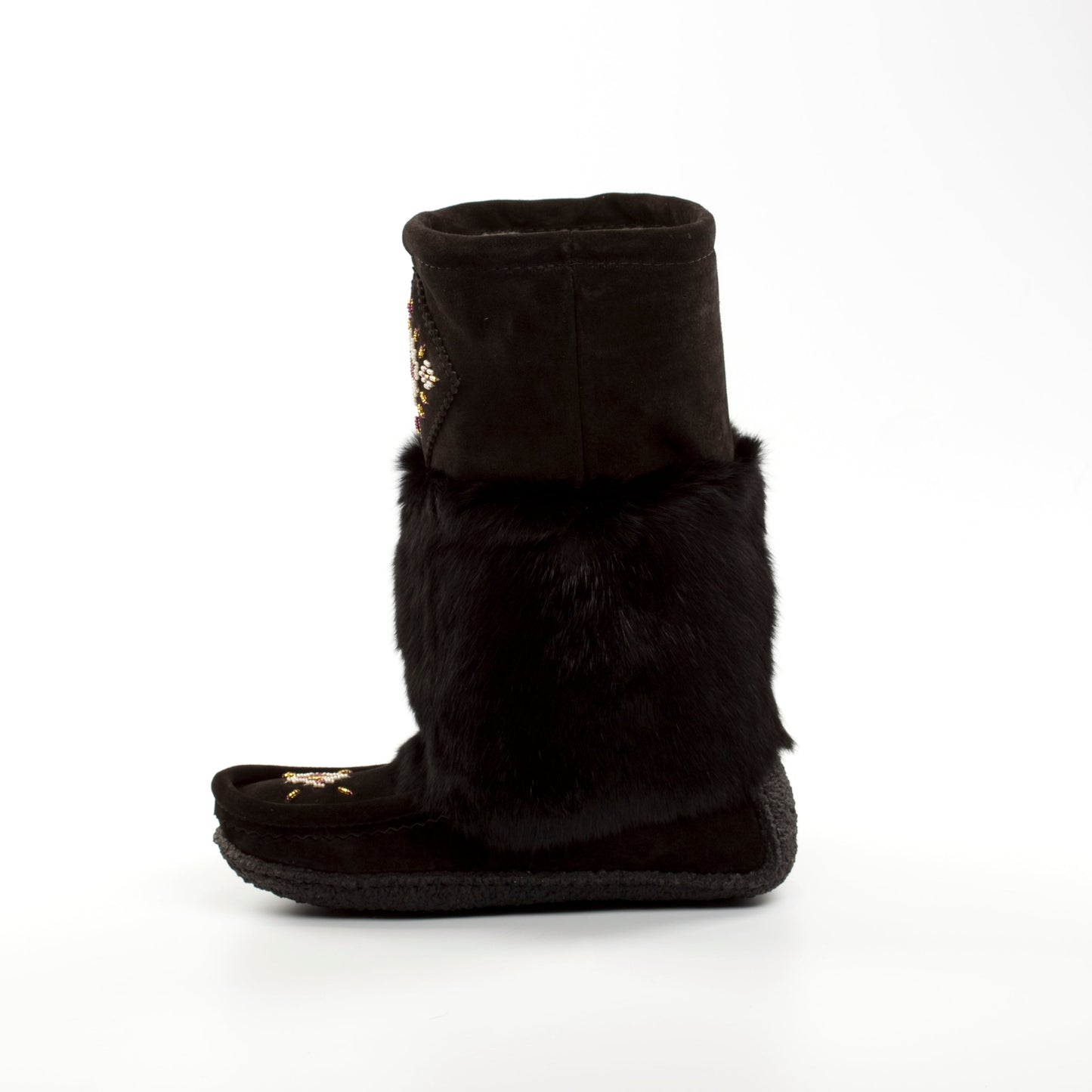 Black boot with fur trim on a white background