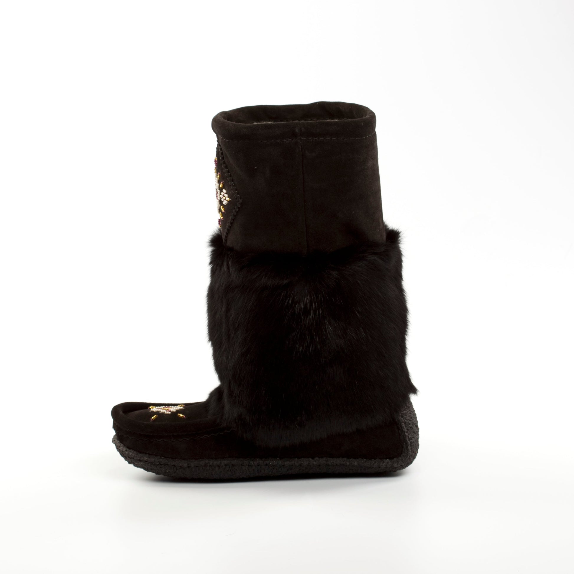 Black boot with fur trim on a white background