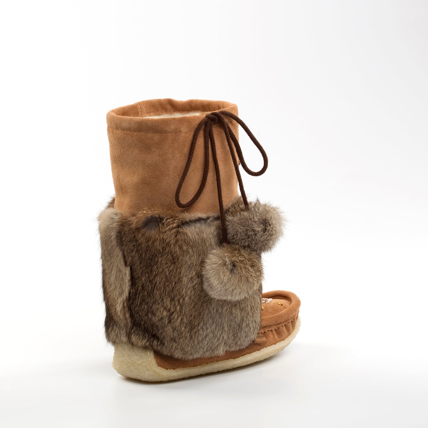 Brown moccasin-style boot with fur trim on a white background