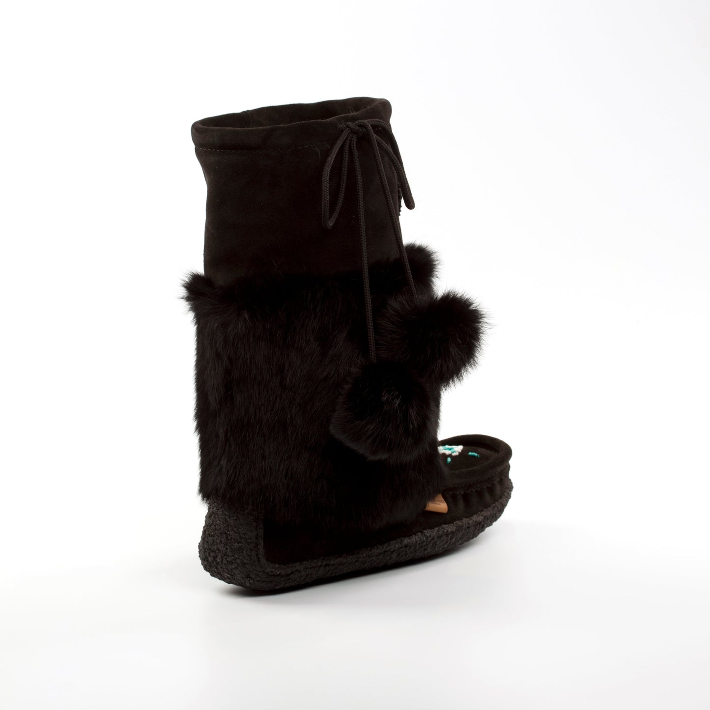 Black suede boot with fur trim on a white background
