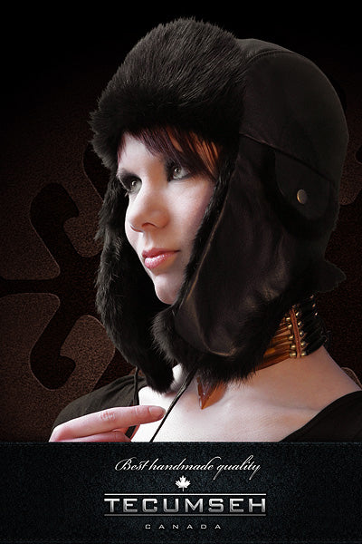 Person wearing a dark helmet with fur lining, brand 'Tecumseh' visible