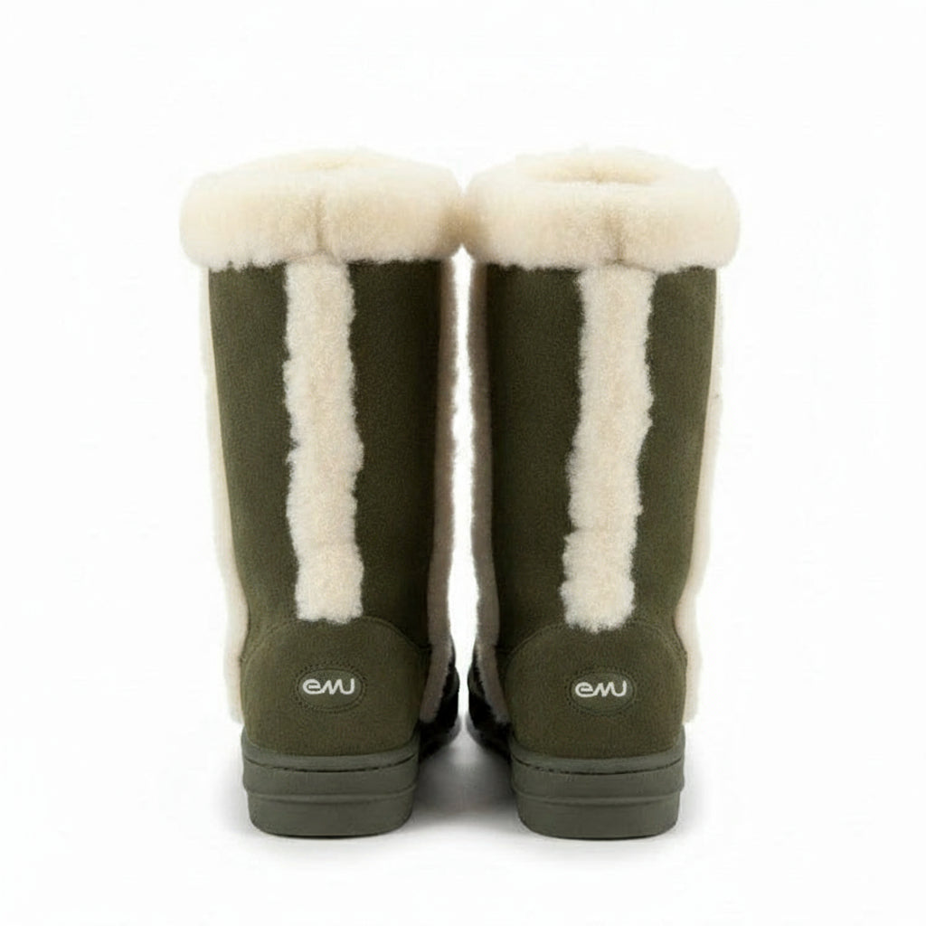 Pair of green boots with white fur lining on a white background