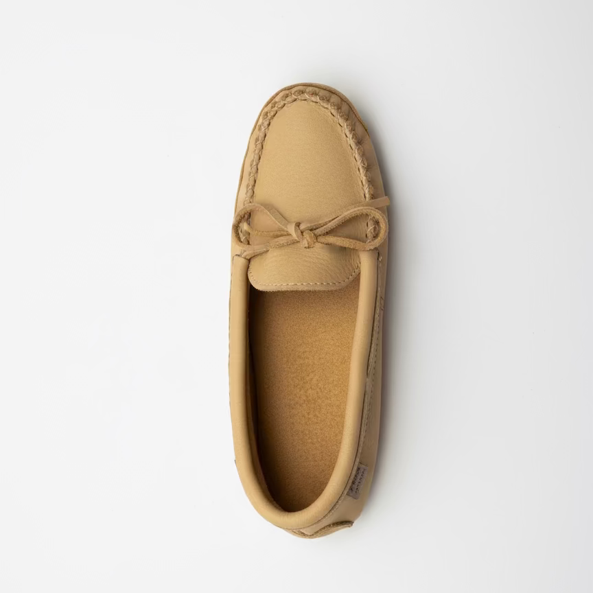 Tan loafer shoe on a white background