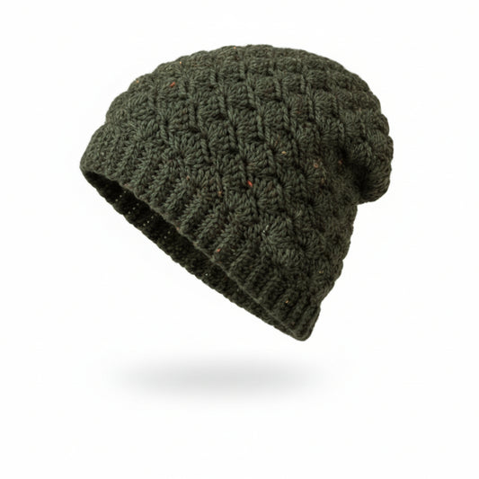Green knit beanie on a light gray background