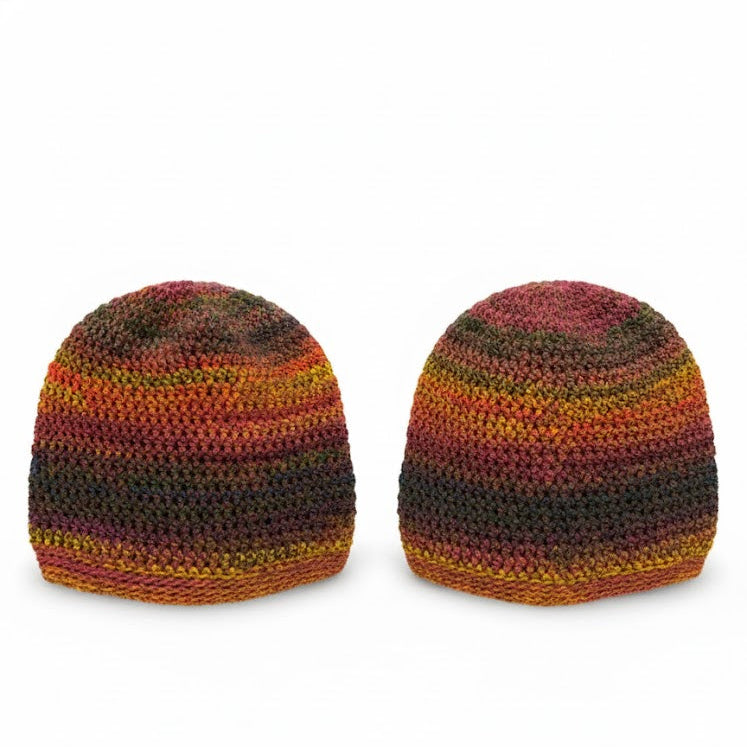 Two striped knit hats on a white background