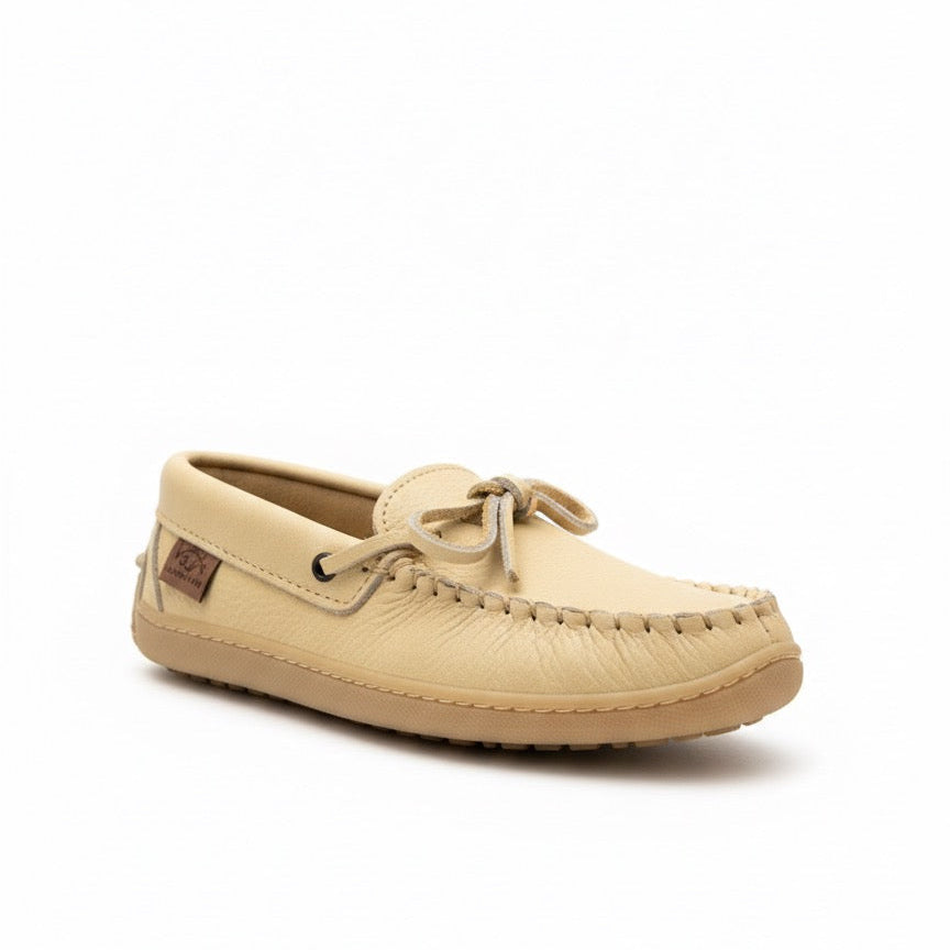 Beige moccasin shoe on a white background