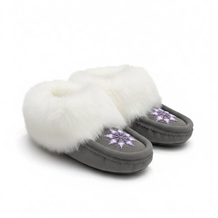 Pair of gray slippers with white fur lining on a white background