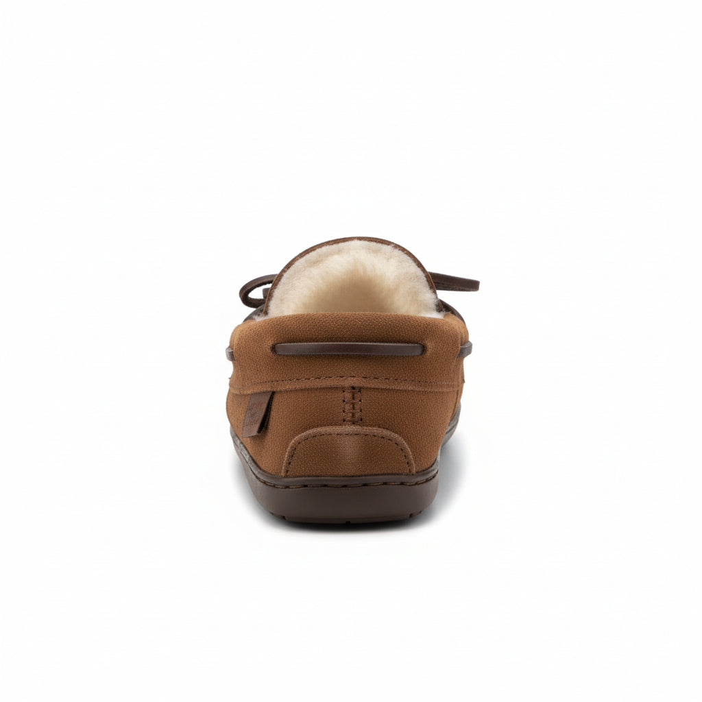 The back heel of a brown moccasin