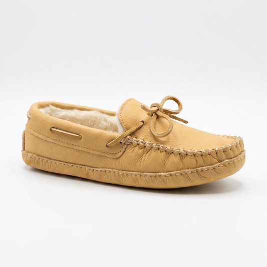Tan moccasin slipper with sheepskin lining on a white background