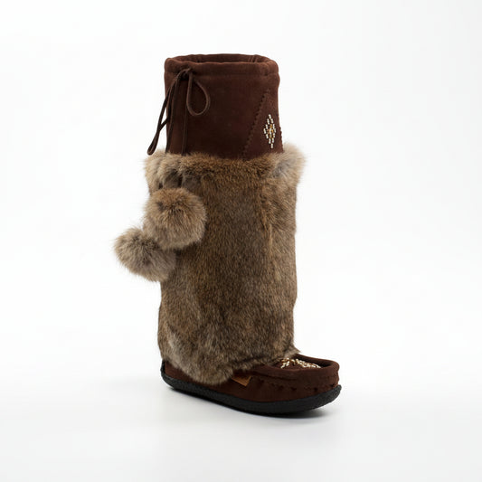 Brown fuzzy boot with a decorative top on a white background