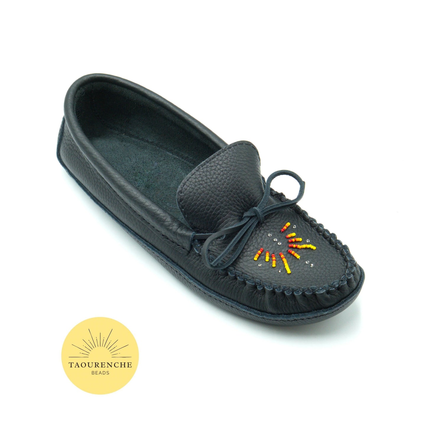 Black moccasin slipper with bead design on a white background, featuring the Taourenche Beads logo.