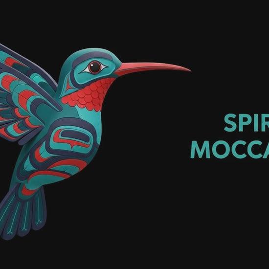 Humming bird from Spirit moccasins drinking from flowers 