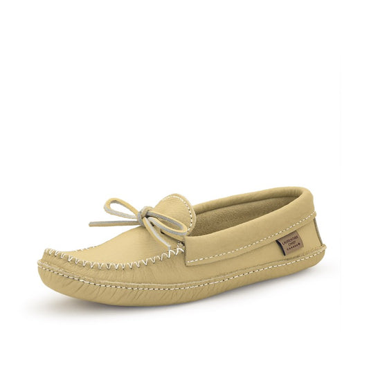 Beige moccasin shoe on a white background